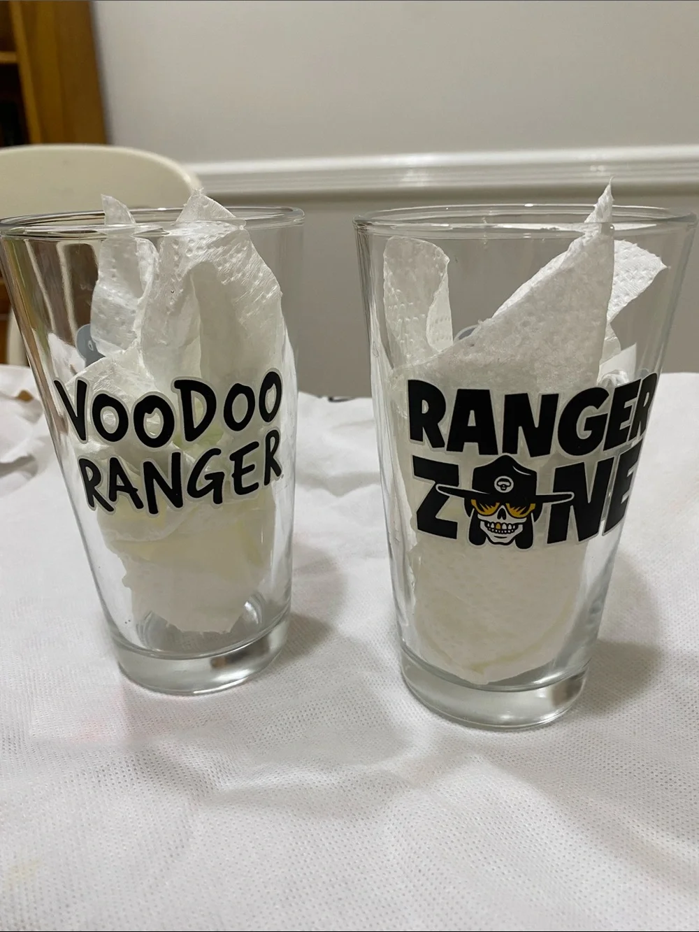 NWOT.  Set of 2, “Voodoo Ranger”, clear with black graphics, pint glasses.